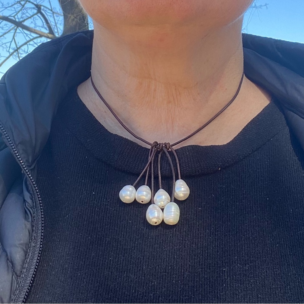 NWT pearl necklace on brown leather cord.